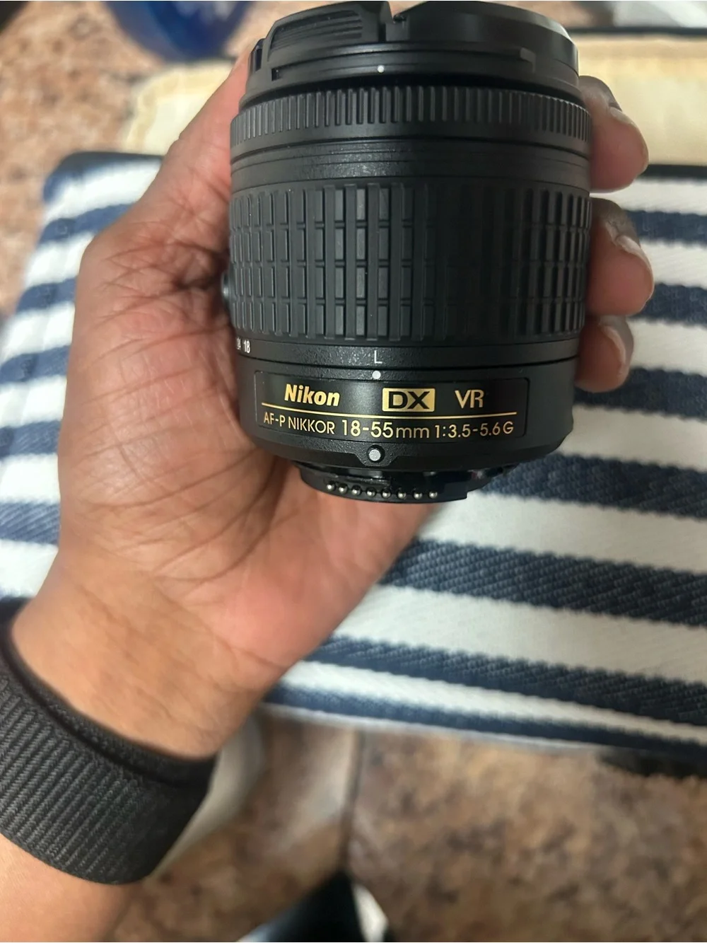 Nikon D3400 Black DSLR with Attached Nikon Lens